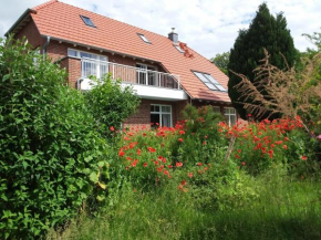 Haus Rosengarten- Ruhige Ferienwohnungen im Grünen, Sehlen